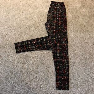LuLaRoe One Size Leggings in an Aztec like print.